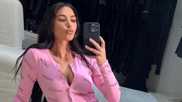 Kim Kardashian pouting and taking a selfie