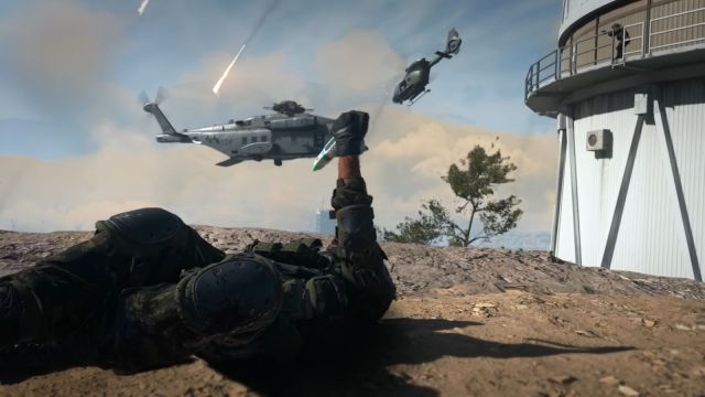 Image showcasing Call of Duty Warzone 2 with a helicopter in the background. A wounded player is visible and is attempting to use a stim.