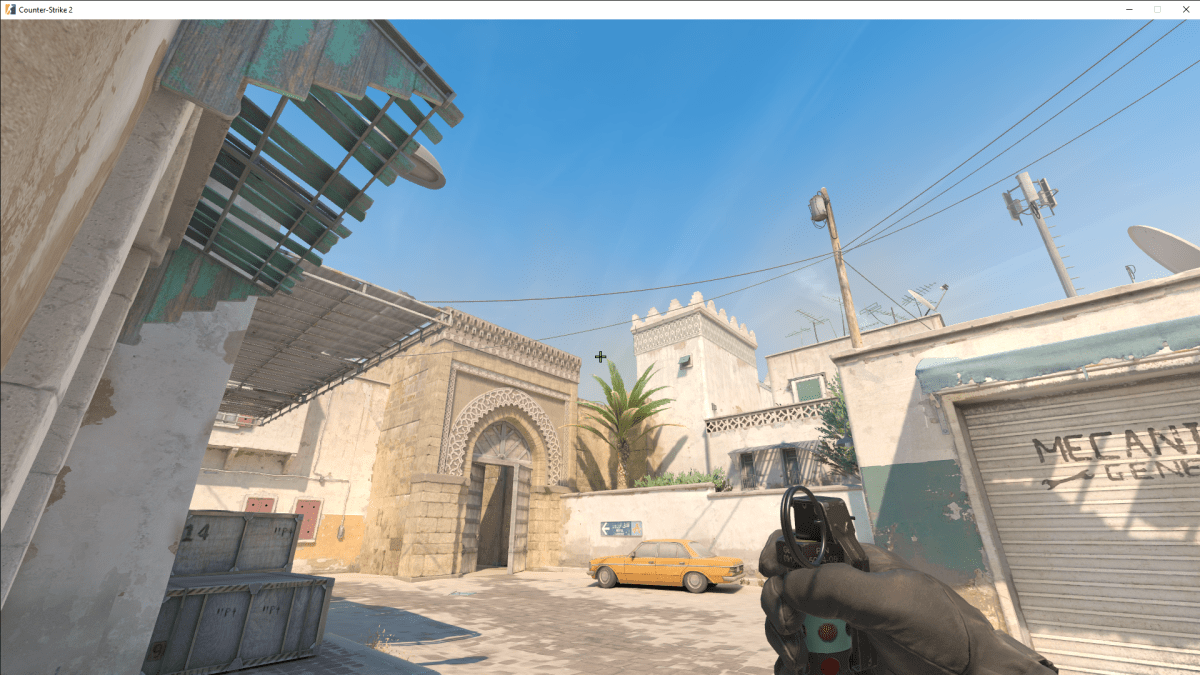 Screenshot taken of player aiming a flashbang toward the sky in Dust 2's CS2.