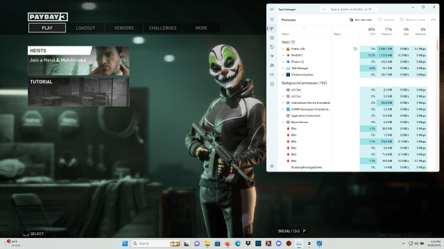 Displays the Windows task manager over the Payday 3 home menu.