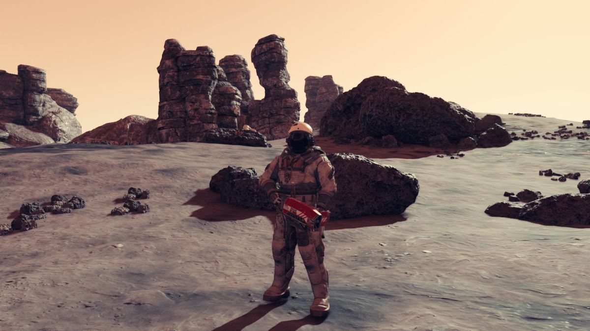 Starfield character standing on Zamka, a rocky planet with an orange sky.