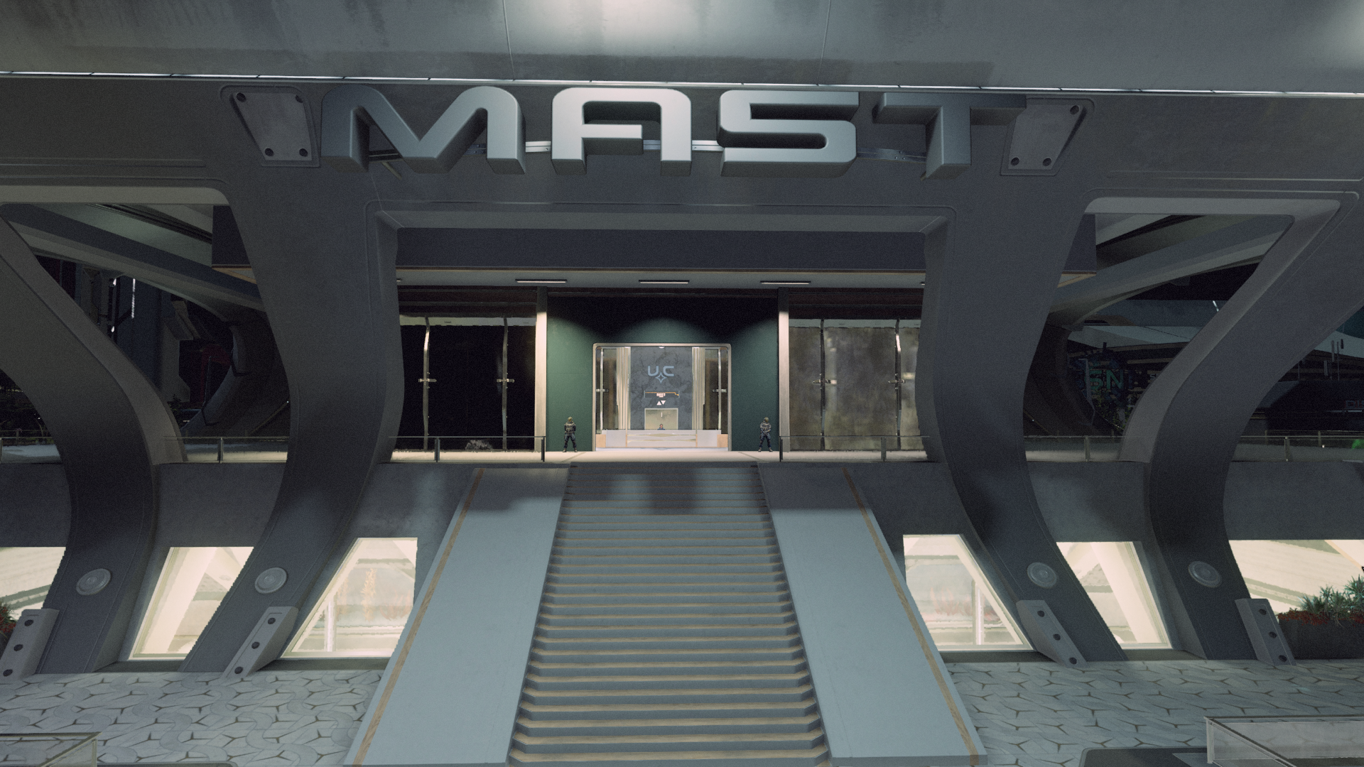 Image of a large, steel building with the word 'MAST' spelled out on the front.