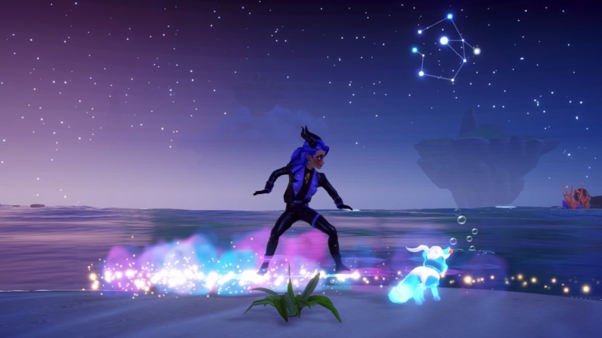 A player gliding along the beach at night in disney dreamlight valley