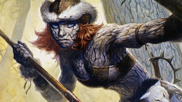 A female hunter wearing a fur cap and leather armor covers her skin in bark as she raises her spear on this MtG card art.