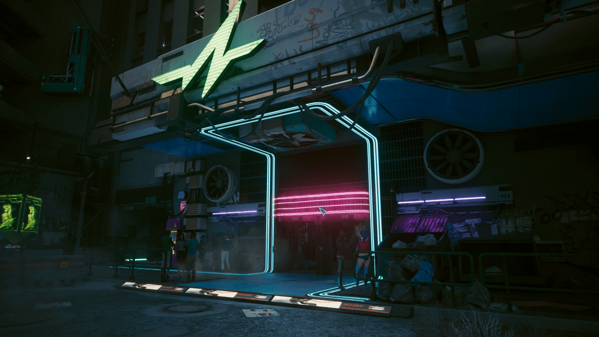 People standing outside the entrance of the Afterlife bar in Night City, in Cyberpunk 2077.