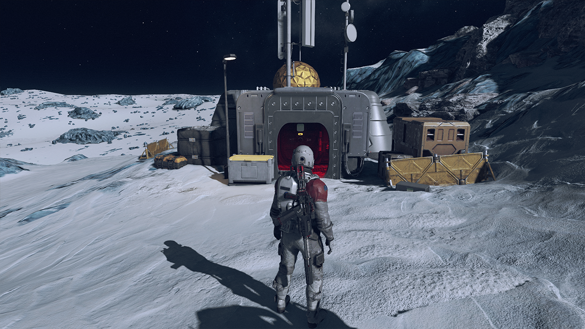An astronaut stands on the surface of a barren planet in Starfield. 