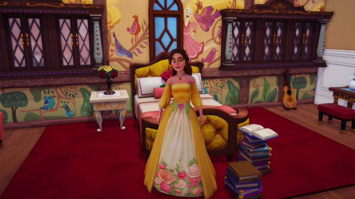 The player dressed up as Belle standing in a princess bedroom.