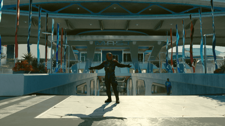 A man stands in front of a large building in Starfield.