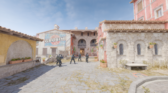 Screenshot taken of Inferno's CT spawn in CS2, featuring five Counter-Terrorists with pistols in hands.