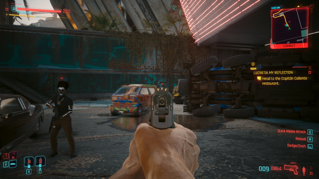 V shooting a thug with a silenced pistol in a Dogtown parking lot (Cyberpunk 2077).