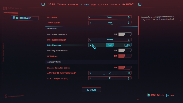 shows the Graphics menu in Cyberpunk 2077 with DLSS Sharpness set to 0.50.