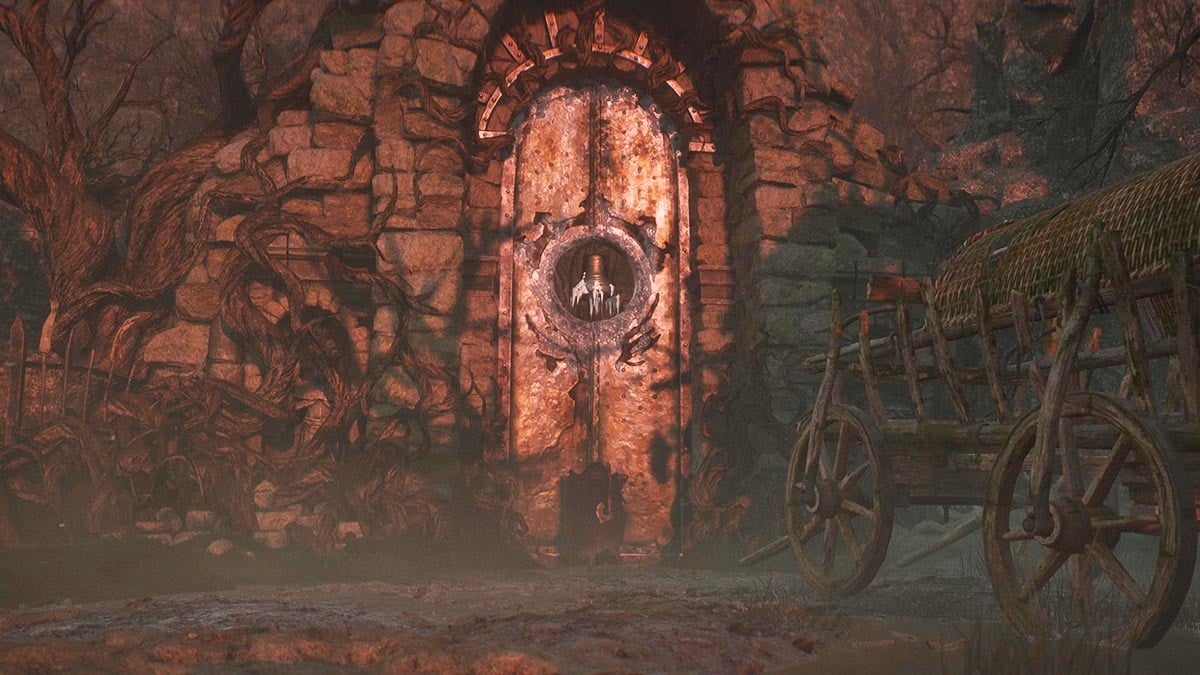 A character opening an ornate bell door in Lords of the Fallen