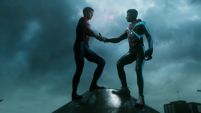 Peter Parker and Miles Morales shaking hands, standing on top of a building.