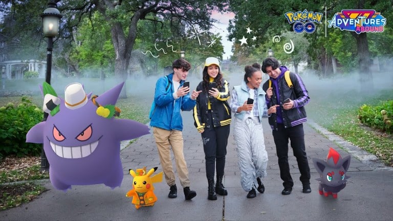 Four friends playing Pokemon Go together around Halloween.