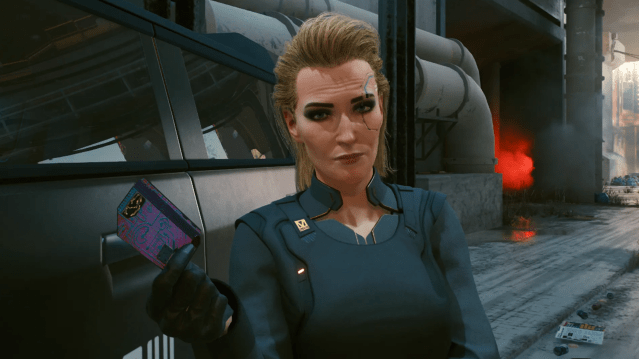 Screenshot of Meredith Stout from Cyberpunk 2077 holding a key card. 