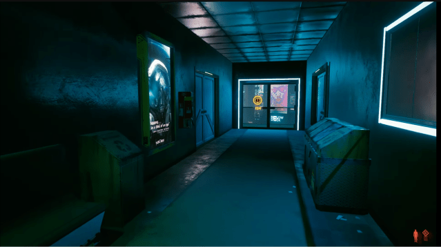 A hallway with three doors at the end of it from the