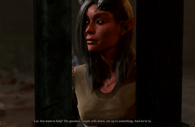 image displays a Tiefling woman in Baldur's Gate 3 who is wearing rags and inside a jail cell.