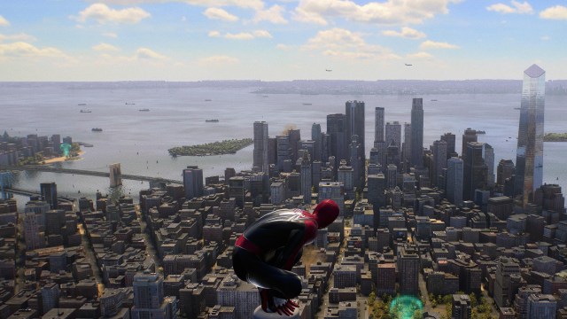 Peter crouching on top of a tall building in Spider-Man 2.