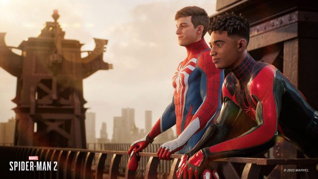 Peter Parker and Miles Morales, unmasked, looking off into the distance in Marvel's Spider-Man 2.