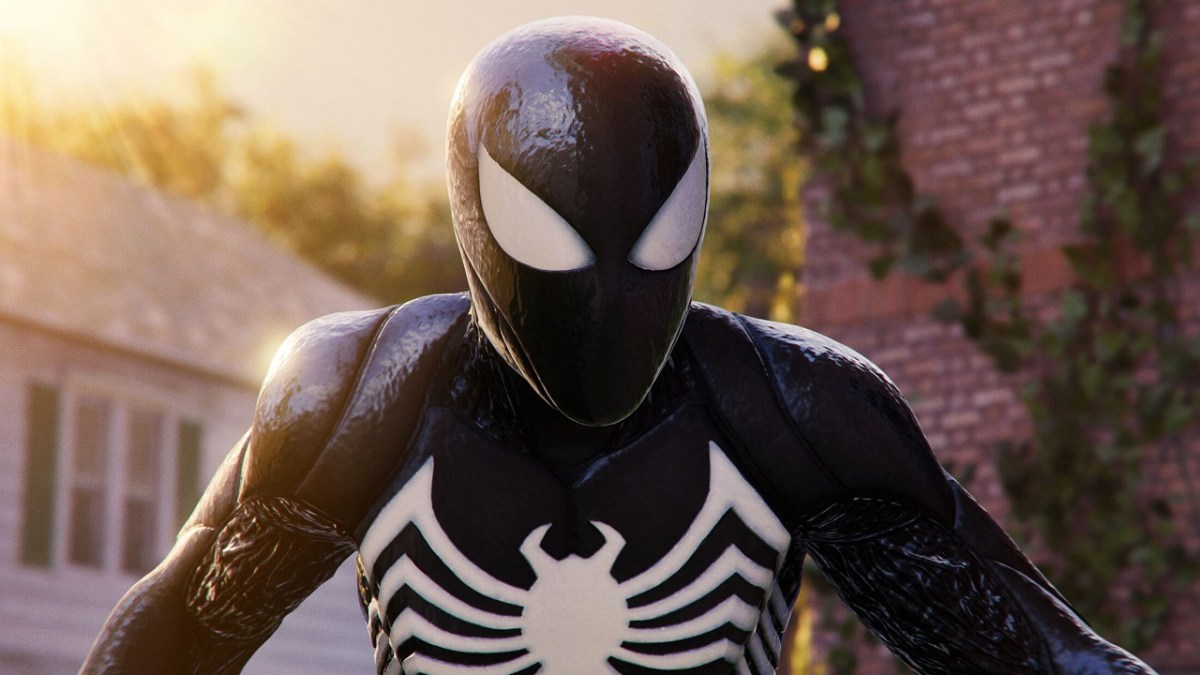 There is a picture of Spider-Man in his black symbiote suit. There are houses behind him in the distance.