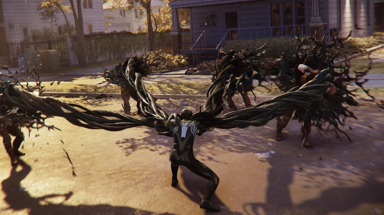 There is a shot of Spider-Man using the symbiote to fight a group of thugs. They are in a residential area. 