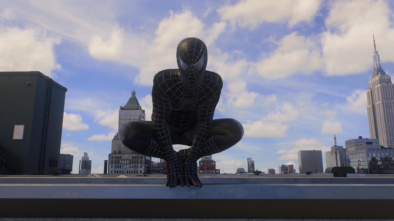 There is a picture of Spider-Man wearing a black webbed suit.