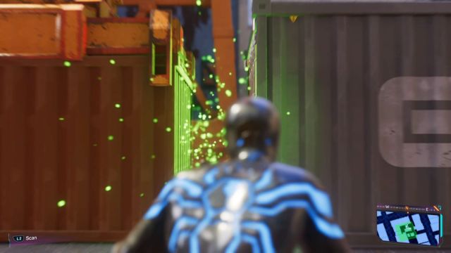 Spider-Man scanning the gap between two containers