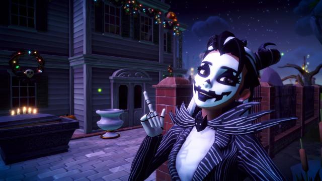 The player taking a selfie with the back side of the Haunted Mansion and pointing at the back door.