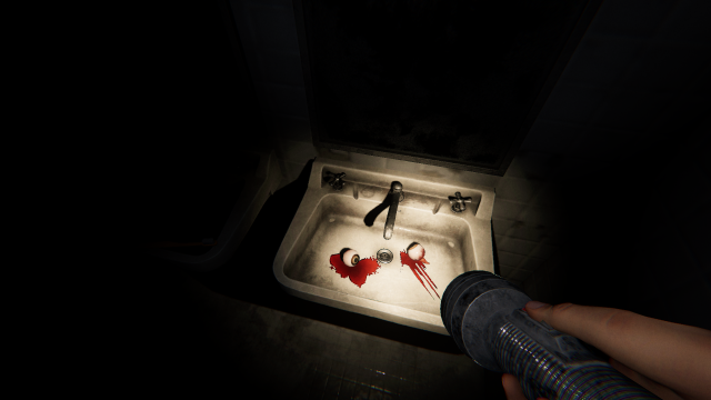 Two bloody eyeballs in a sink.