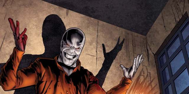 The Chameleon wearing a prison jumpsuit in a Marvel comic.