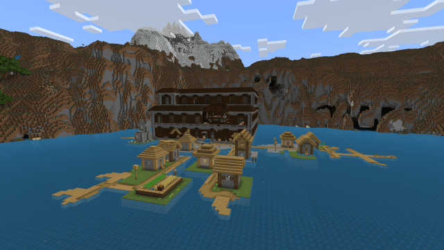 A Minecraft Village and Woodland Mansion side-by-side.