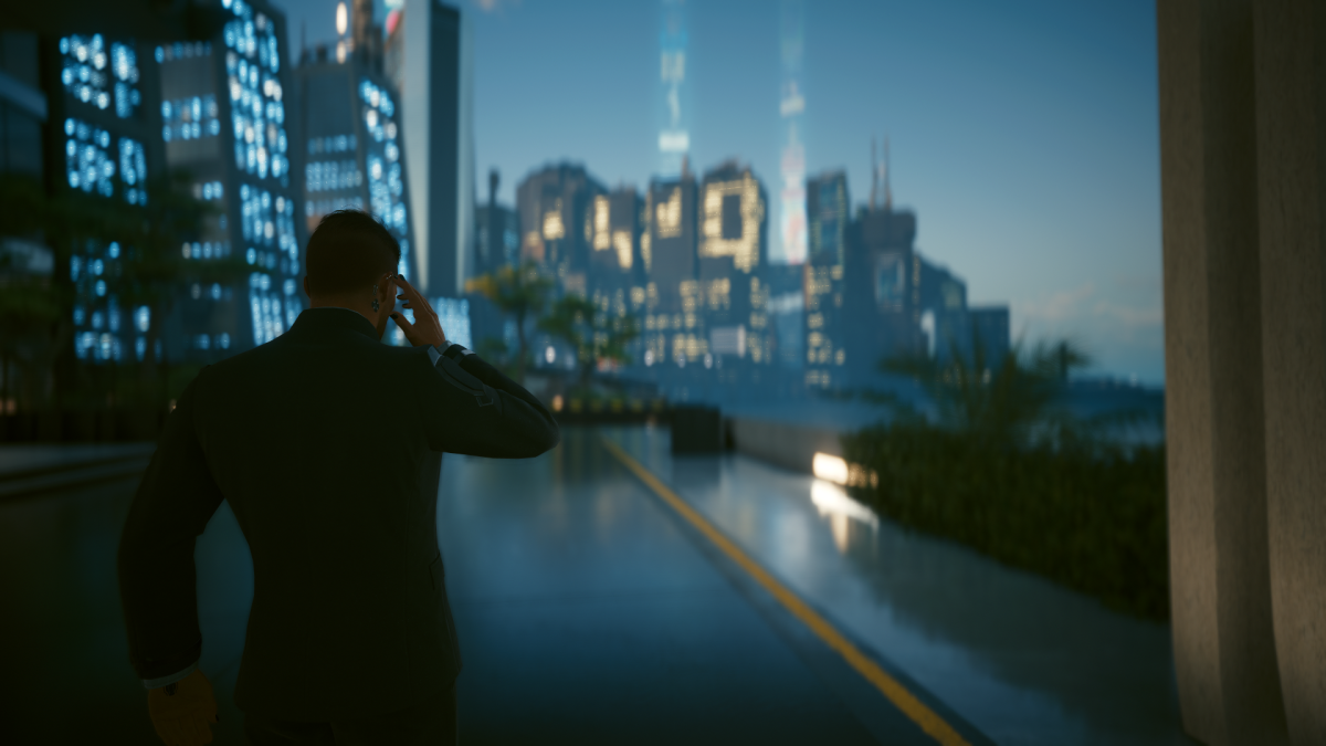 V looking out over Night City from the window of a skyscraper in Cyberpunk 2077.