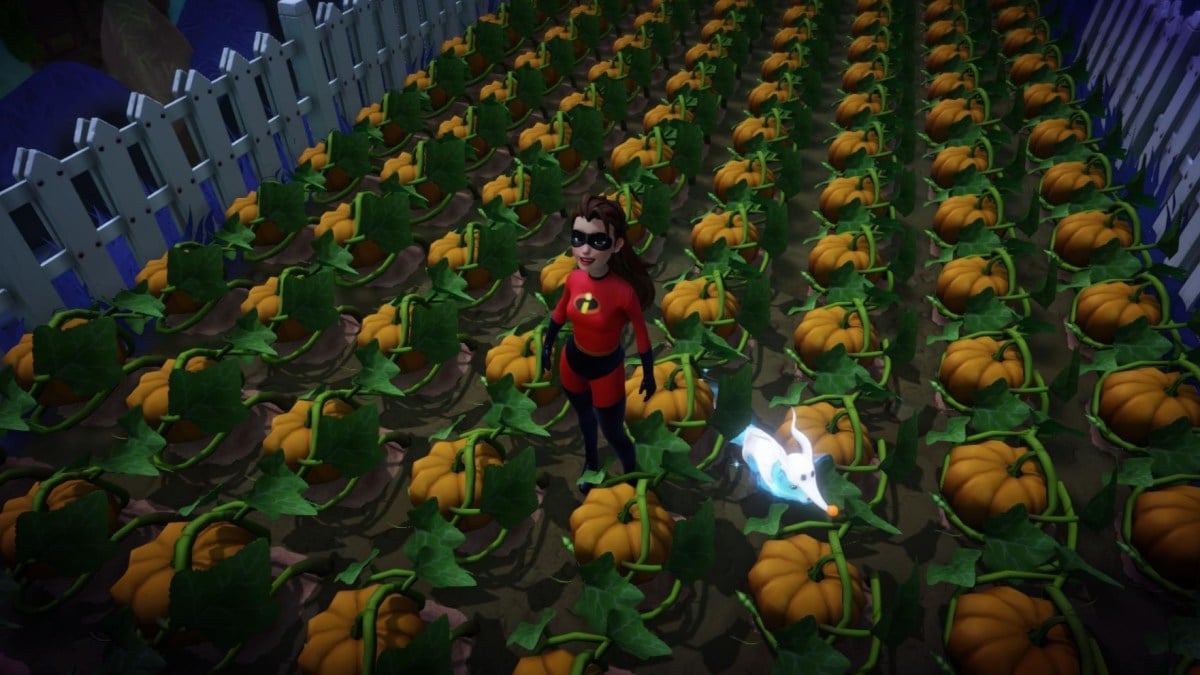 The player standing in a pumpkin field dressed in an Incredibles costume.