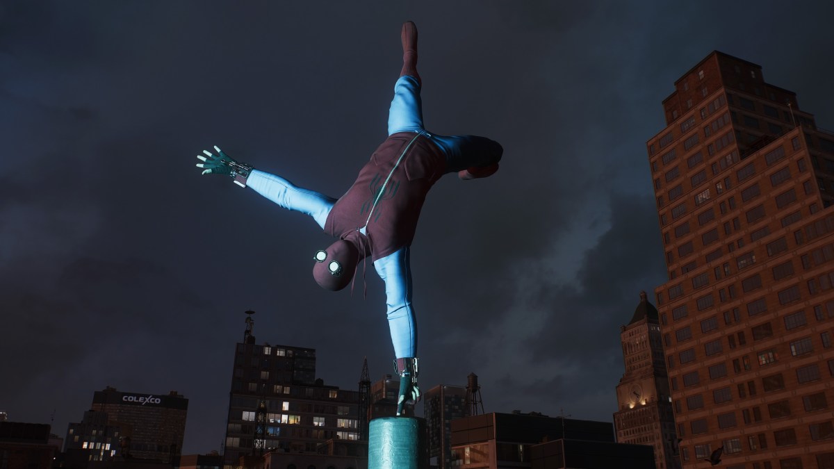 Spider-Man doing a fun pose on a building wearing the Homemade suit from Spider-Man Homecoming.