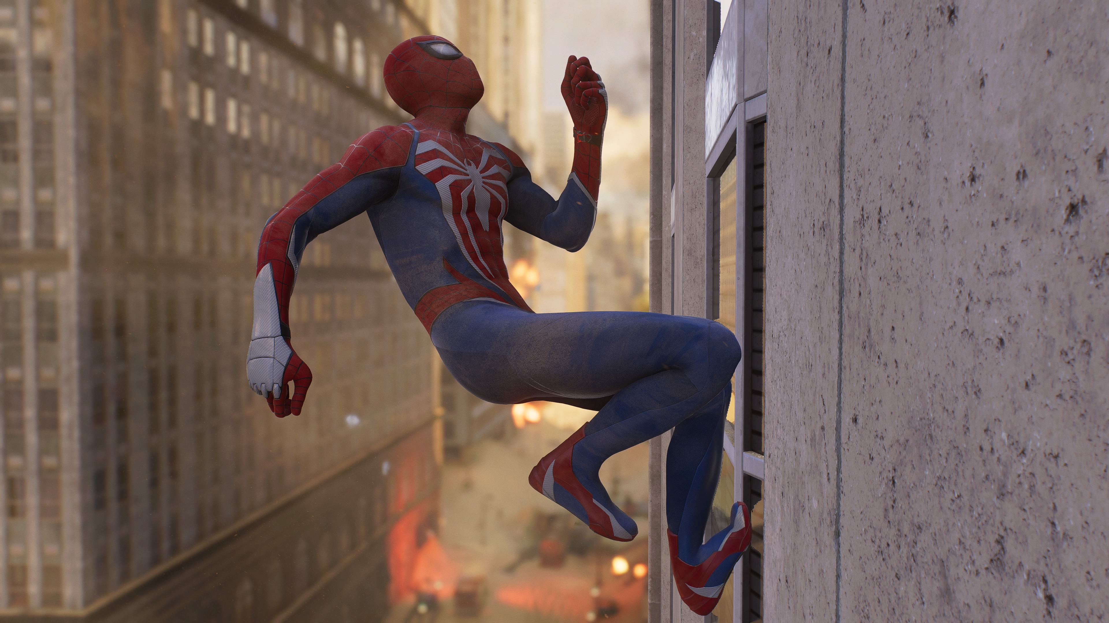 Peter Parker Spider-Man running up the side of a building in Marvel's Spider-Man 2.