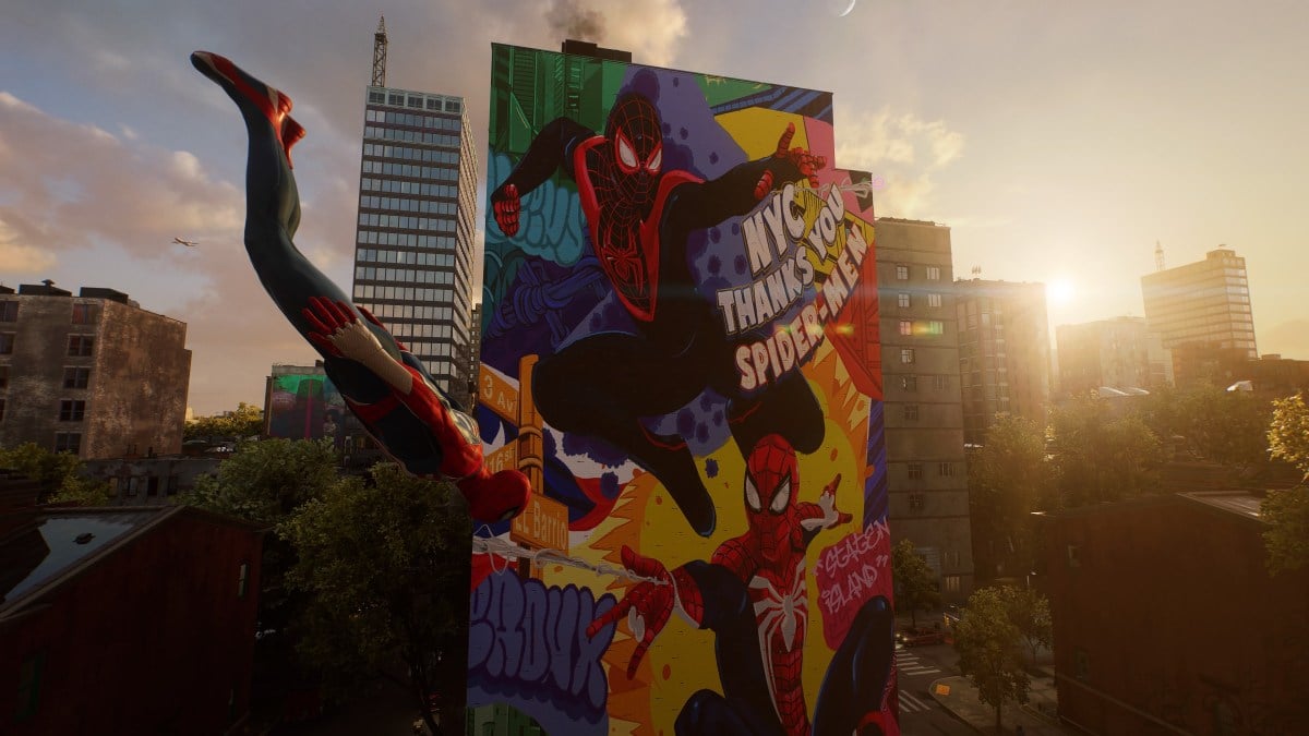 Spider-Man diving past a mural of both Spider-Men in NYC.