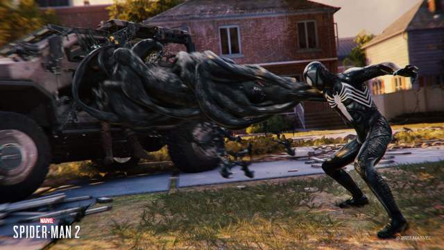 Peter Parker wrecks some enemies with his symbiote suit's abilities.