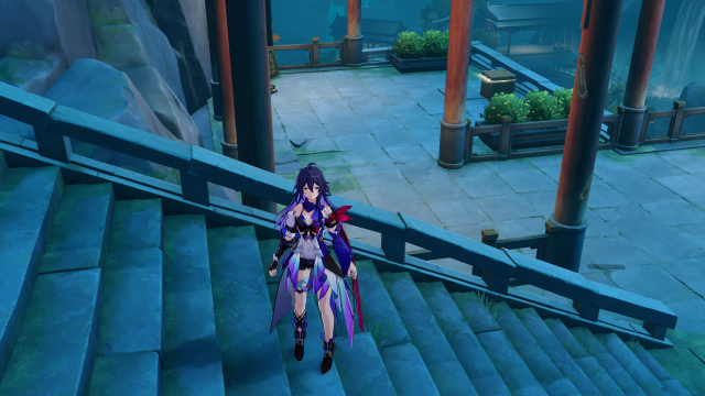 Seele standing on some stairs with a chest in the background.