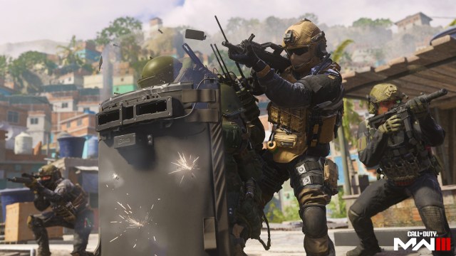 A player using a Riot Shield taking incoming fire for their teammates in MW3.