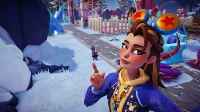 The player pointing at a fox in the Frosted Heights biome in Disney Dreamlight Valley.