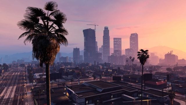A sun setting in the background of a city in GTA 5.