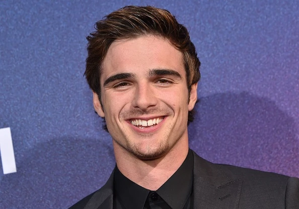 Jacob Elrodi smiling for a photograph.