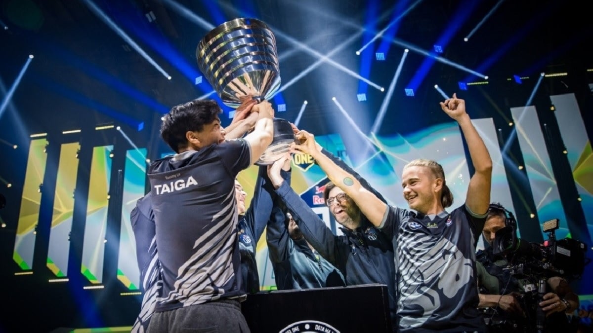 OG lifting the ESL One Stockholm trophy