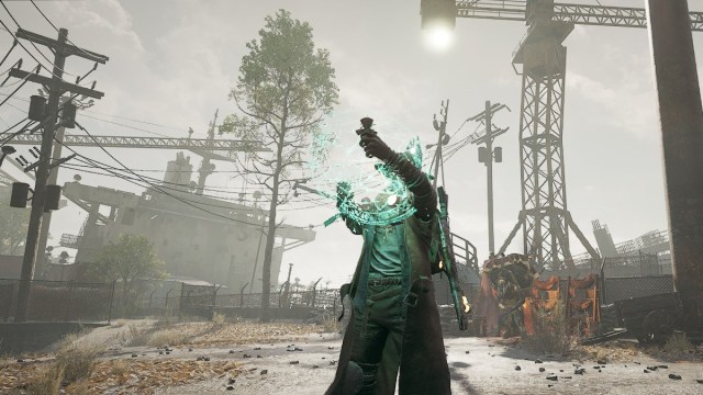 A man casts a rune into the air while wearing cultist clothing in Remnant 2.