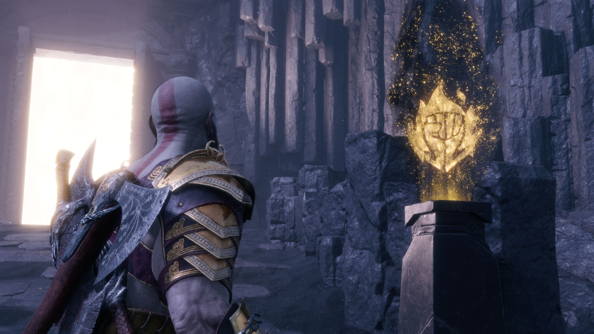 Kratos looks at a plynth near the entrance to Valhalla in God of War Ragnarok.