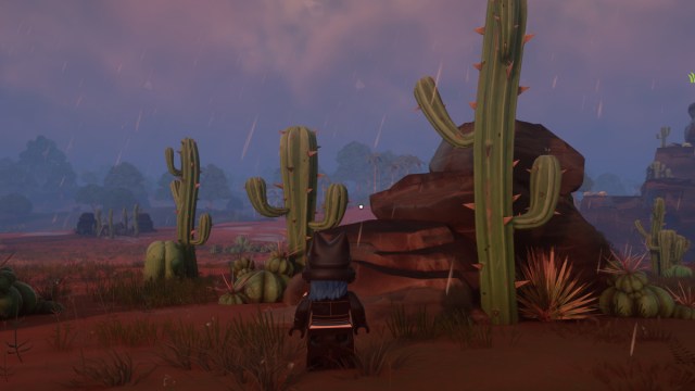 A player in LEGO Fortnite looking at Cactus' in the Desert biome.