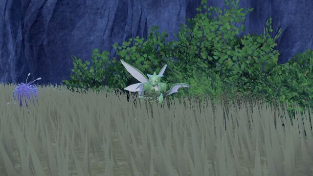 Scyther peering over long grass in The Indigo Disk.