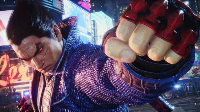 Kazuya Mishima punching toward the camera.