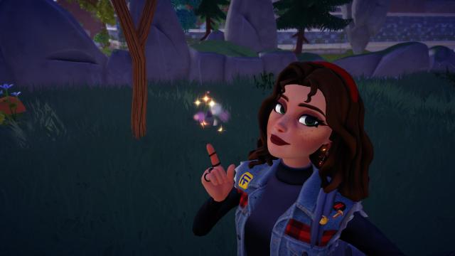 The player taking a selfie in Disney Dreamlight Valley with the fourth Matryoshka Doll.