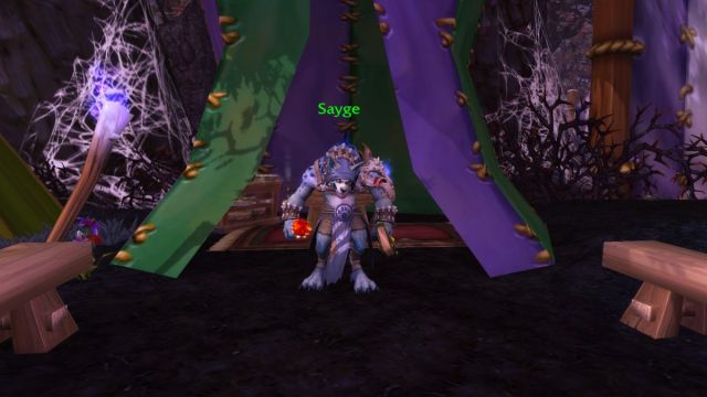 Sayge NPC in his tent in World of Warcraft's Darkmoon Faire.